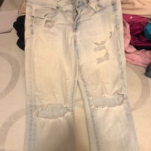 Light wash jeans w/ rips